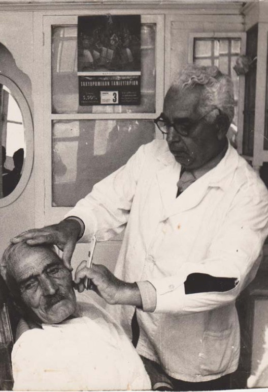 D. Antonakakis in his barber shop